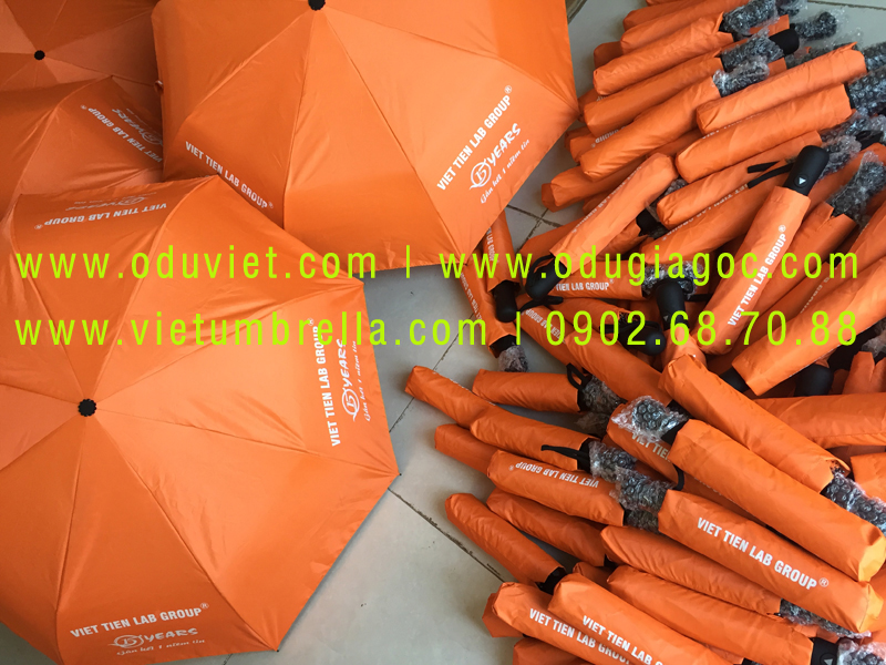 xưởng sản xuất ô dù cầm tay in logo quảng cáo